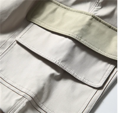 White cuffed pants pocket
